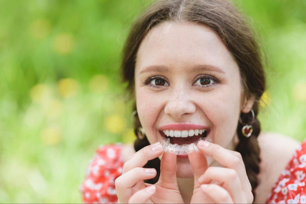 Patient using Invisalign in Austin.